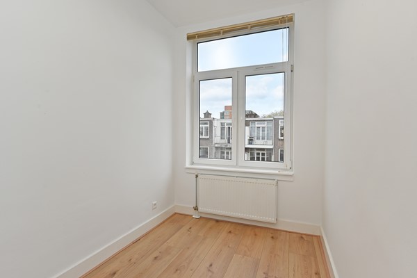 Medium property photo - Deimanstraat 309, 2522 BK Den Haag